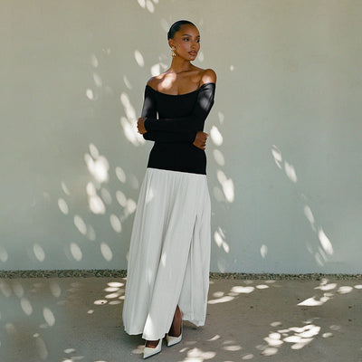 Robe femme – épaules dénudées – taille cintrée – manches longues – jupe maxi plissée