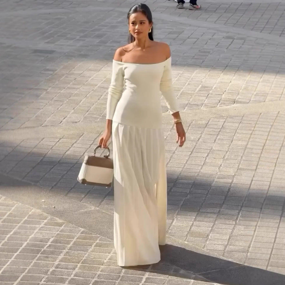 Robe femme – épaules dénudées – taille cintrée – manches longues – jupe maxi plissée